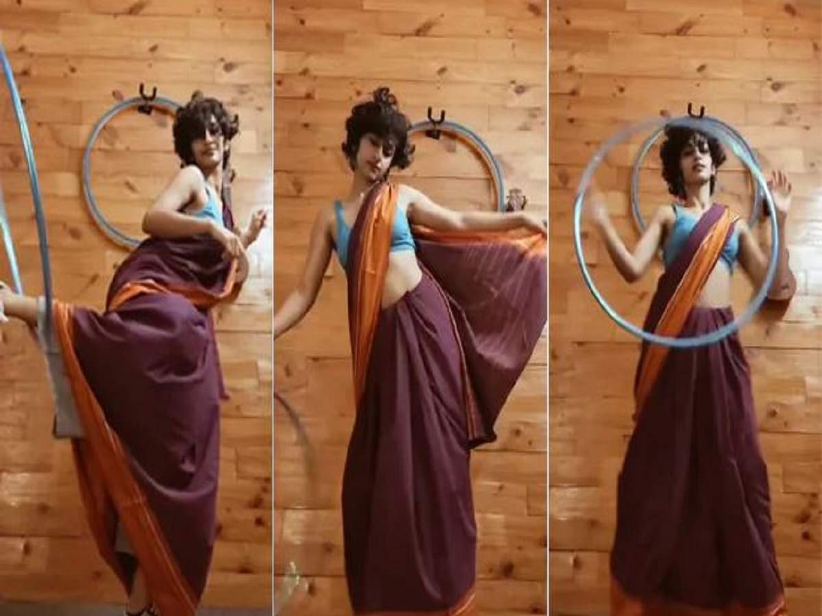 eshna kutty: শাড়ি-স্নিকার্সে মন মাতানো ‘হুলা হুপ’! এষণায় মজে নেটপাড়া… – saree, sneakers and hula hoop, eshna kutty’s dance to genda phool is creating waves on social media
